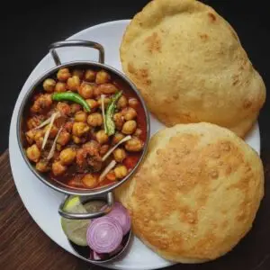 Chola+ 4 Puri + Rice + Saled